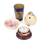 A ROYAL DOULTON STONEWARE BEAKER TOGETHER WITH TWO PIECES OF MOORCROFT AND A CLARICE CLIFF PRESERVE