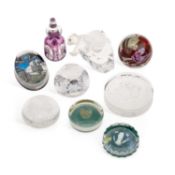 A GROUP OF GLASS PAPERWEIGHTS