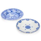 A 19TH CENTURY BLUE TRANSFER PRINTED POTTERY PLATE TOGETHER WITH A 19TH CENTURY TIN-GLAZED PLATE