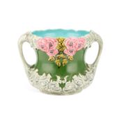 A CONTINENTAL MAJOLICA TWO-HANDLED JARDINIERE