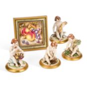 A SET OF FOUR CAPODIMONTE FIGURES OF THE SEASON