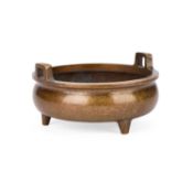 A CHINESE BRONZE TRIPOD CENSER