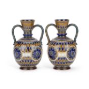 A PAIR OF DOULTON LAMBETH STONEWARE TWO HANDLED VASES