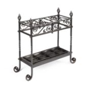 AN ARTS AND CRAFTS WROUGHT IRON STICKSTAND