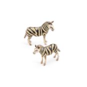 TWO ITALIAN SILVER AND ENAMEL MODELS OF ZEBRAS