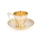 A 19TH CENTURY RUSSIAN SILVER-GILT CUP AND SAUCER