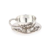 A FINE JAPANESE SILVER CUP AND SAUCER MEIJI PERIOD (1868–1912)