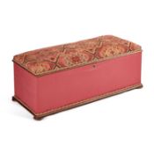 A VICTORIAN MAHOGANY AND UPHOLSTERED OTTOMAN