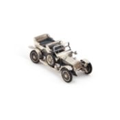 AN ITALIAN SILVER MODEL OF A VINTAGE CAR