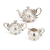 A CHINESE SILVER THREE-PIECE TEA SERVICE LATE 19TH/ EARLY 20TH CENTURY