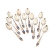 A SET OF TWELVE DUTCH SILVER AND ENAMEL TEASPOONS