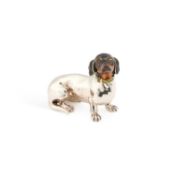 AN ITALIAN SILVER AND ENAMEL MODEL OF A DACHSHUND DOG