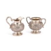 A CHINESE SILVER CREAM JUG AND SUGAR BOWL LATE 19TH/ EARLY 20TH CENTURY