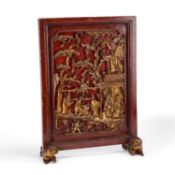 A CHINESE CARVED AND LACQUERED SCREEN CIRCA 1900