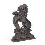 A 19TH CENTURY CAST IRON DOOR STOP