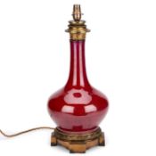 A CHINESE SANG DE BOEUF VASE, CONVERTED TO A LAMP THE MOUNTS 19TH CENTURY EUROPEAN, THE PORCELAIN 19