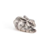 A SILVER MODEL OF A RABBIT
