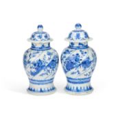 A PAIR OF CHINESE BLUE AND WHITE PORCELAIN VASES AND COVERS 19TH CENTURY