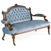 A VICTORIAN WALNUT SETTEE