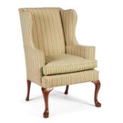 A GEORGE III STYLE WALNUT AND UPHOLSTERED WING-BACK ARMCHAIR EARLY 20TH CENTURY