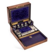 A 19TH CENTURY WALNUT TRAVELLING VANITY CASE
