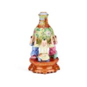 A CHINESE FAMILLE ROSE PORCELAIN 'BOYS CARRYING VASE' VASE