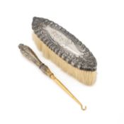 A TIFFANY & CO STERLING SILVER-MOUNTED CLOTHES BRUSH AND BUTTON HOOK