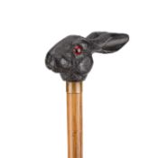 A LATE VICTORIAN CARVED PARASOL HANDLE