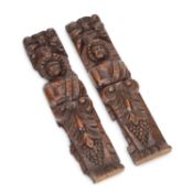 A PAIR OF OAK FIGURAL CORBELS 19TH CENTURY