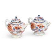 A PAIR OF 18TH CENTURY CHINESE IMARI PORCELAIN TEAPOTS