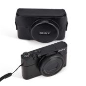A SONY CYBERSHOT DSC-RX100 DIGITAL CAMERA