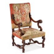 A 19TH CENTURY WALNUT AND UPHOLSTERED ARMCHAIR