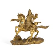 A CHINESE GILT-BRONZE FIGURE OF GUAN YU ON HORSEBACK