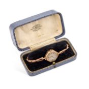 A LADY'S 9CT GOLD BRACELET WATCH