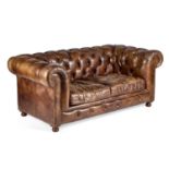 A HALO BROWN LEATHER TWO-SEATER CHESTERFIELD SOFA