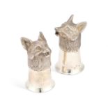 A NEAR PAIR OF ELIZABETH II SILVER FOX HEAD STIRRUP CUPS