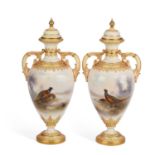 A PAIR OF ROYAL WORCESTER PAINTED PHEASANT VASES AND COVERS BY JAMES STINTON, 20TH CENTURY