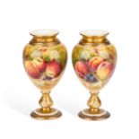 A PAIR OF ROYAL WORCESTER FRUIT PAINTED VASES