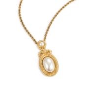 A CHRISTIAN DIOR SIMULATED PEARL PENDANT ON CHAIN