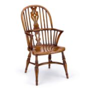 A CHILD'S ELM AND OAK WINDSOR OPEN ARMCHAIR