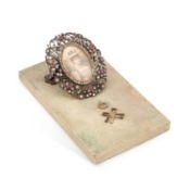 ROYAL INTEREST: A DESKTOP PAPER HOLDER EARLY 20TH CENTURY