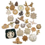 A COLLECTION OF MILITARY CAP BADGES