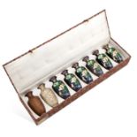 A SET OF EIGHT VASES ILLUSTRATING THE STAGES OF CLOISONNÉ ENAMELLING