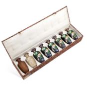 A SET OF EIGHT VASES ILLUSTRATING THE STAGES OF CLOISONNÉ ENAMELLING