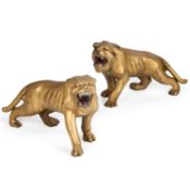 A PAIR OF CARVED AND GILDED TIGERS