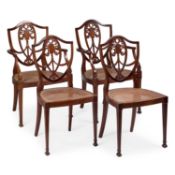 A SET OF FOUR EARLY 20TH CENTURY CANE-SEATED MAHOGANY PARLOUR CHAIRS LABEL OF MARSH, JONES & CRIBB
