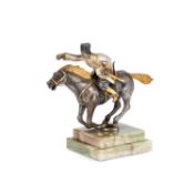 A CONTINENTAL SILVERED AND GILT-BRONZE FIGURE OF A COSSACK RIDER
