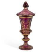 A BOHEMIAN GILT DECORATED AMETHYST GLASS COVERED VASE 19TH CENTURY