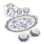 A GILT AND UNDERGLAZE BLUE PORCELAIN CABARET SET 19TH CENTURY