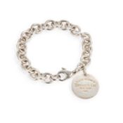 A TIFFANY & CO SILVER 'RETURN TO TIFFANY' CIRCULAR TAG BRACELET